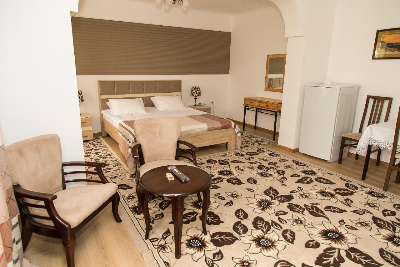 Mirage Hotel Qizilorda Buitenkant foto