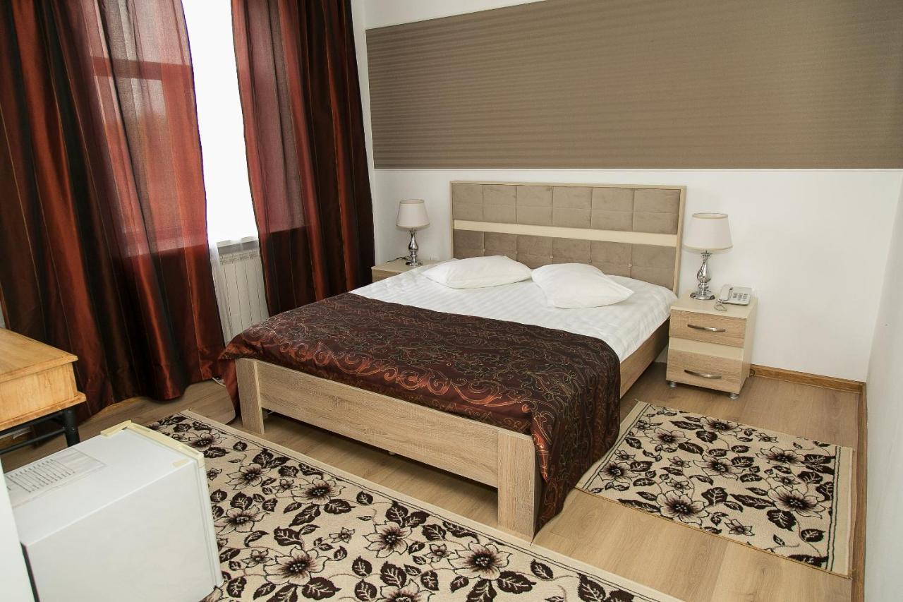 Mirage Hotel Qizilorda Buitenkant foto