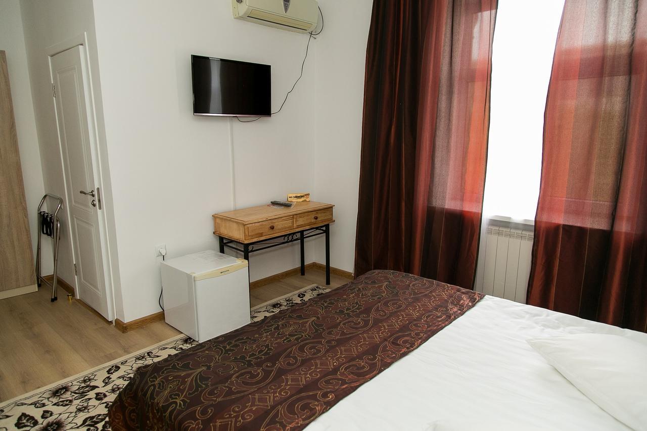 Mirage Hotel Qizilorda Buitenkant foto